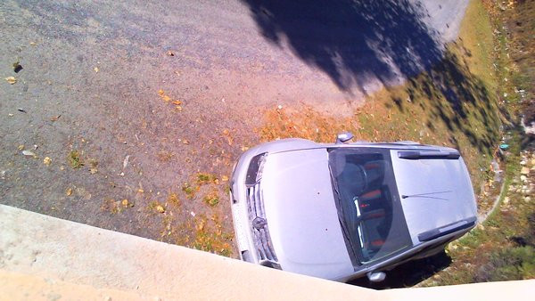 Webcam view of car through window